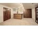 Finished basement with wet bar and built-in storage at 722 S Eagle St, Aurora, CO 80012