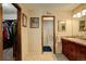 Main bathroom with double vanity and large closet at 722 S Eagle St, Aurora, CO 80012