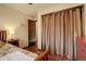 Bedroom with large closet and wood flooring at 722 S Eagle St, Aurora, CO 80012