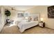 Bright bedroom with carpeted floors and neutral color palette at 722 S Eagle St, Aurora, CO 80012