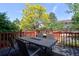 Deck with table and chairs, overlooking backyard at 722 S Eagle St, Aurora, CO 80012