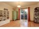 Dining room with hardwood floors and patio access at 722 S Eagle St, Aurora, CO 80012