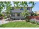 Two-story house exterior with backyard view at 722 S Eagle St, Aurora, CO 80012