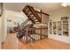 Wood staircase with open risers and storage shelving at 722 S Eagle St, Aurora, CO 80012