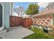 Fenced backyard featuring a cozy patio area and lush garden space for relaxation at 12125 Bannock St # C, Westminster, CO 80234