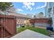 Cozy backyard featuring an outdoor patio, garden area, and privacy fencing at 12125 Bannock St # C, Westminster, CO 80234