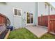 A cozy backyard with a small patio, ready for outdoor relaxation and gardening in a tranquil setting at 12125 Bannock St # C, Westminster, CO 80234