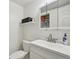 Bright bathroom featuring white vanity, modern fixtures, and ample storage space at 12125 Bannock St # C, Westminster, CO 80234