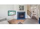 Inviting living room with a fireplace, TV, and hardwood floors at 12125 Bannock St # C, Westminster, CO 80234