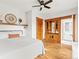 The bedroom offers wood floors, light walls, and charming wooden trim and doors at 2124 E 17Th Ave # 4, Denver, CO 80206