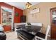 Bright dining area featuring a built-in bench, dark wood table, and decorative lighting at 12744 Leyden St # F, Thornton, CO 80602
