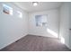 Bright bedroom with neutral carpet, natural light and white walls at 13588 E 103Rd Pl, Commerce City, CO 80022