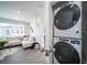 Convenient stacked washer and dryer located near the living area at 13588 E 103Rd Pl, Commerce City, CO 80022