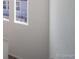 Bright stairway with white walls and carpeted steps at 13588 E 103Rd Pl, Commerce City, CO 80022