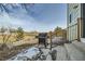 Backyard patio with grill and view of open space at 11058 Grange Creek Dr, Thornton, CO 80233