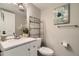 Clean bathroom with white vanity and updated fixtures at 11058 Grange Creek Dr, Thornton, CO 80233