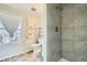 Updated bathroom with a large walk-in shower at 11058 Grange Creek Dr, Thornton, CO 80233