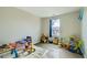 bedroom with playful decor and hardwood floors at 11058 Grange Creek Dr, Thornton, CO 80233