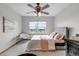 Inviting bedroom with a large window, soft lighting, and comfortable furnishings, creating a relaxing atmosphere at 25245 E Park Crescent Dr, Aurora, CO 80016
