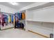 Spacious walk-in closet with ample hanging space and shelving for organized storage at 25245 E Park Crescent Dr, Aurora, CO 80016