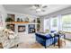 This living room has a fireplace and a comfortable seating area at 25245 E Park Crescent Dr, Aurora, CO 80016