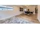 Modern dining area featuring sleek chairs, contemporary lighting, and stylish decor at 1640 Iola St, Aurora, CO 80010