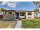 Charming home featuring tasteful modern upgrades and a well-maintained lawn at 1640 Iola St, Aurora, CO 80010