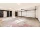 Spacious three-car garage with concrete flooring and plenty of room for storage at 1640 Iola St, Aurora, CO 80010