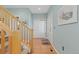 Bright foyer with tile flooring and staircase leading to the upper level at 427 S Parkside Dr, Longmont, CO 80501