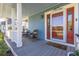 Inviting front porch with rocking chair and comfortable seating, perfect for relaxing outdoors at 427 S Parkside Dr, Longmont, CO 80501