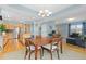 Open living space with kitchen, dining area, and living room, ideal for entertaining at 427 S Parkside Dr, Longmont, CO 80501