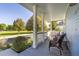 Inviting front porch with comfortable seating and views of the neighborhood at 427 S Parkside Dr, Longmont, CO 80501