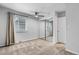Bedroom with mirrored closet and ceiling fan at 857 S Van Gordon E104 Ct # E104, Lakewood, CO 80228