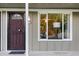 Condo entry with security door and window at 857 S Van Gordon E104 Ct # E104, Lakewood, CO 80228