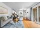 Bright living room with hardwood floors and access to patio at 857 S Van Gordon E104 Ct # E104, Lakewood, CO 80228