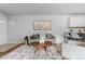 Living room with hardwood floors and neutral decor at 857 S Van Gordon E104 Ct # E104, Lakewood, CO 80228