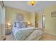 A well-lit bedroom boasts an en suite bathroom at 10356 Lions Heart, Lone Tree, CO 80124