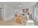 Light streams into a well-staged bedroom with an en suite bathroom at 10356 Lions Heart, Lone Tree, CO 80124