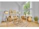 Cozy living room featuring a large window, stylish furniture, and neutral tones for a relaxing ambiance at 10356 Lions Heart, Lone Tree, CO 80124