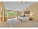 Spacious main bedroom featuring vaulted ceiling, natural light, and stylish decor at 10356 Lions Heart, Lone Tree, CO 80124