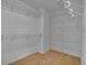 A walk-in closet features white wire shelving for ample storage and organization at 10356 Lions Heart, Lone Tree, CO 80124