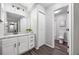 Updated bathroom with white vanity, modern fixtures, and new flooring at 14435 E 1St Dr # B2, Aurora, CO 80011