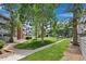 Beautiful condo community boasts lush lawns, mature trees, and easy walking access at 14435 E 1St Dr # B2, Aurora, CO 80011
