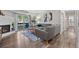 Bright living room with fireplace, hardwood floors, and comfortable seating at 14435 E 1St Dr # B2, Aurora, CO 80011