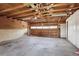 Spacious two car garage with ample storage space and a utility door at 10505 Clarkson St, Northglenn, CO 80233