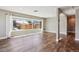 Bright living room with large windows and hardwood floors providing lots of natural light at 10505 Clarkson St, Northglenn, CO 80233