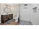 Bright bathroom with modern finishes, a walk-in glass shower, and neutral tones at 10553 Stonemeadow Dr, Parker, CO 80134