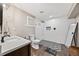Updated bathroom featuring a glass shower, modern vanity and stylish tile flooring at 10553 Stonemeadow Dr, Parker, CO 80134