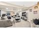 Spacious living room with plush carpeting and ample seating at 10553 Stonemeadow Dr, Parker, CO 80134
