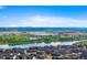 Scenic aerial view overlooking neighborhood homes and community lakes at 12826 Lake Port St, Longmont, CO 80504